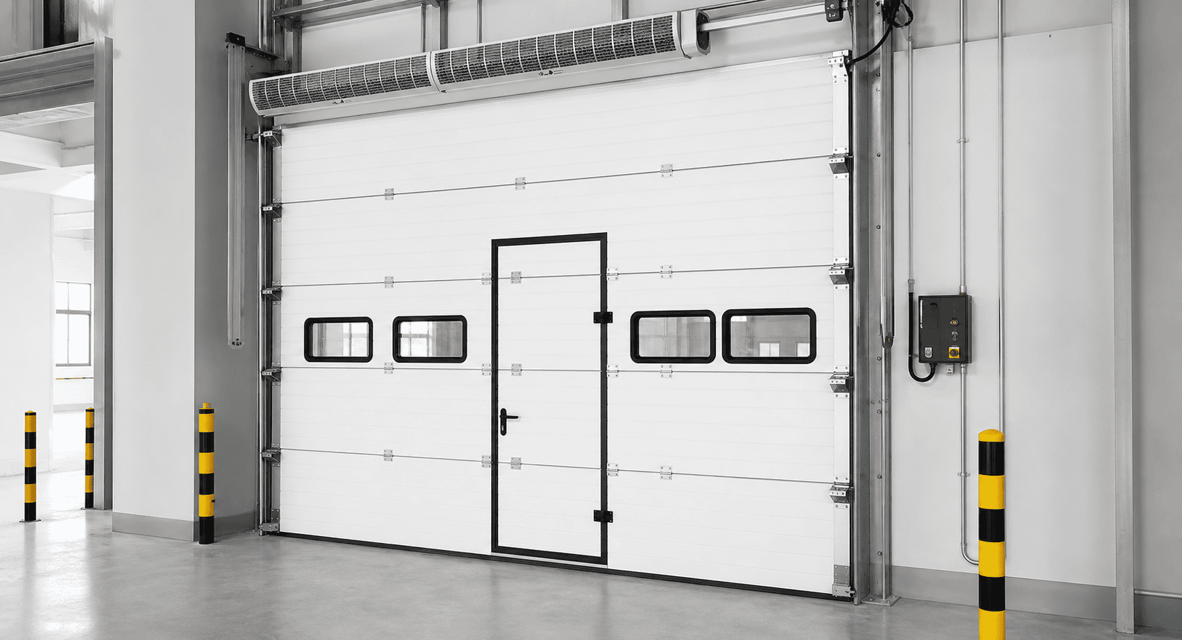 custom insulated sectional overhead door with windows and pedestrian door